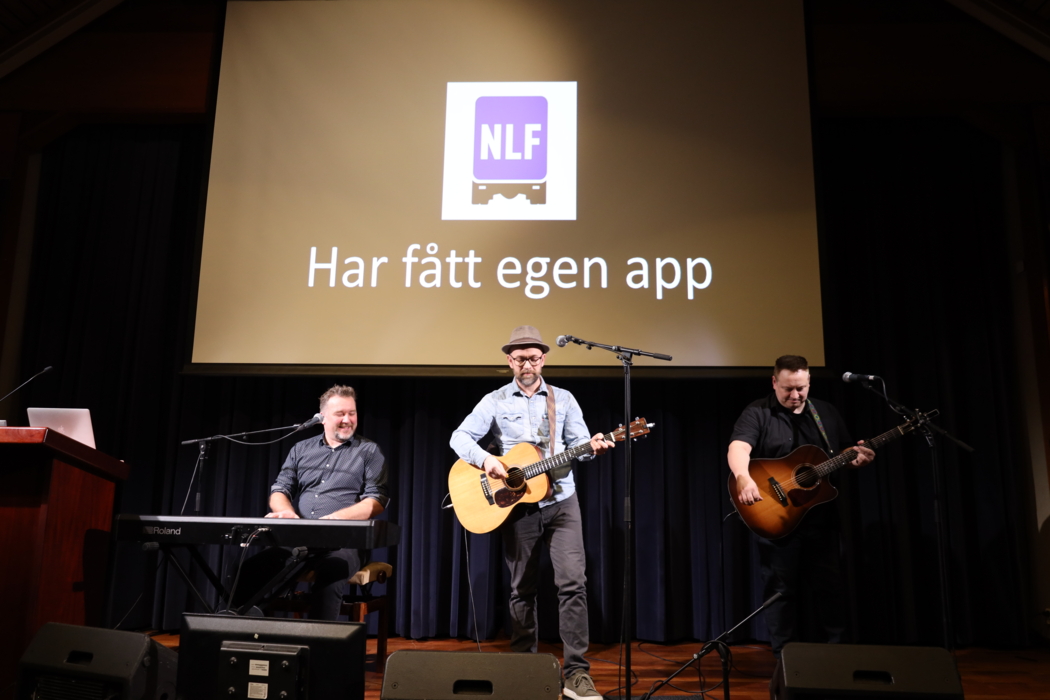 VIKTIG MELDING: NLF har fått egen app! I forbindelse med lanseringen under Transportkonferansen ble det laget en egen sang om hvordan appen fungerer i regi av bandet Rocksberg.